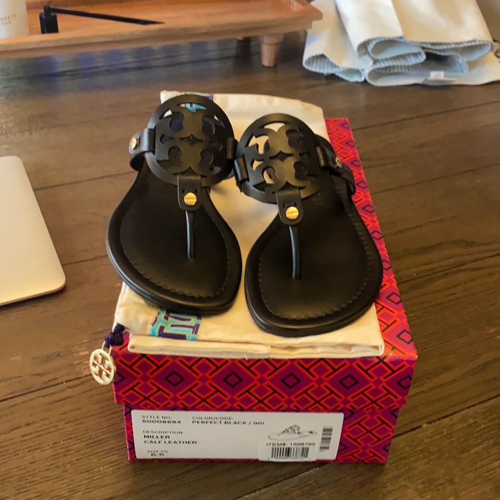 Matte black Tory Burch Miller sandals.